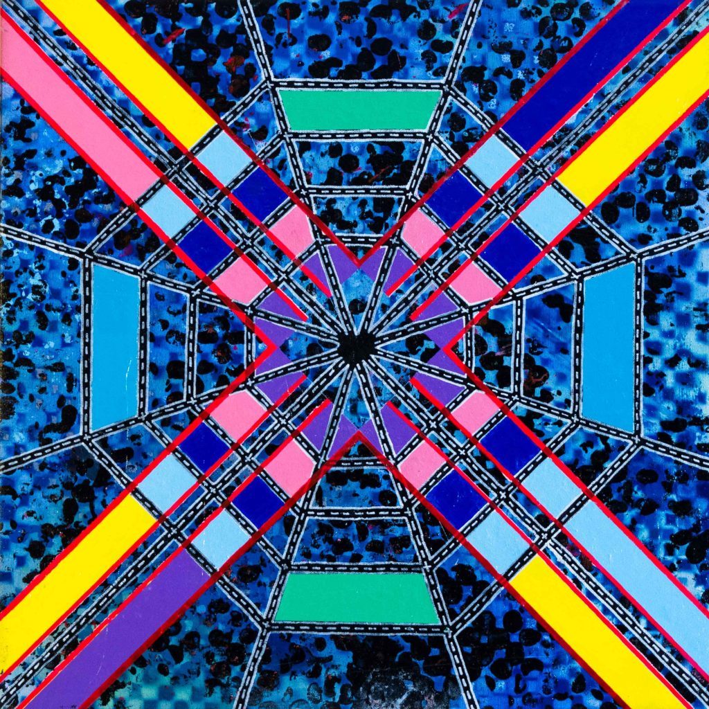 Patrón geométrico simétrico con formas radiantes en azul, rosa, amarillo y turquesa que crean un efecto de profundidad