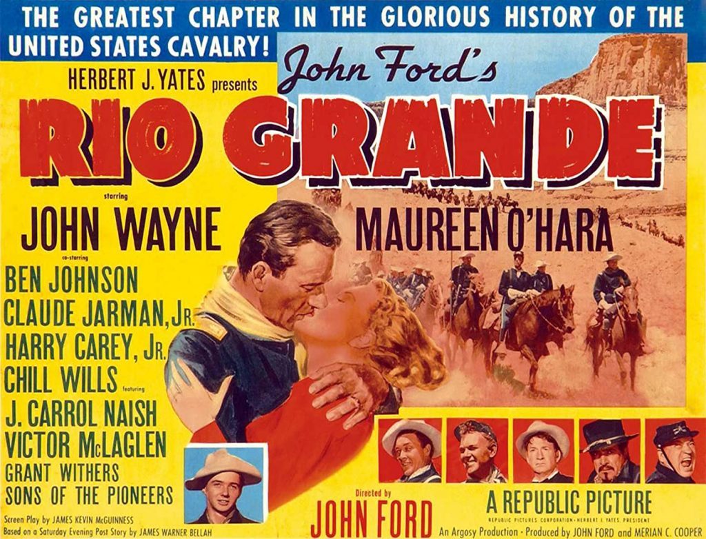 "Río Grande", de John Ford: Movimientos que expresan a la vida Póster de Río Grande de John Ford con John Wayne y Maureen O'Hara, actores principales en escena de abrazo