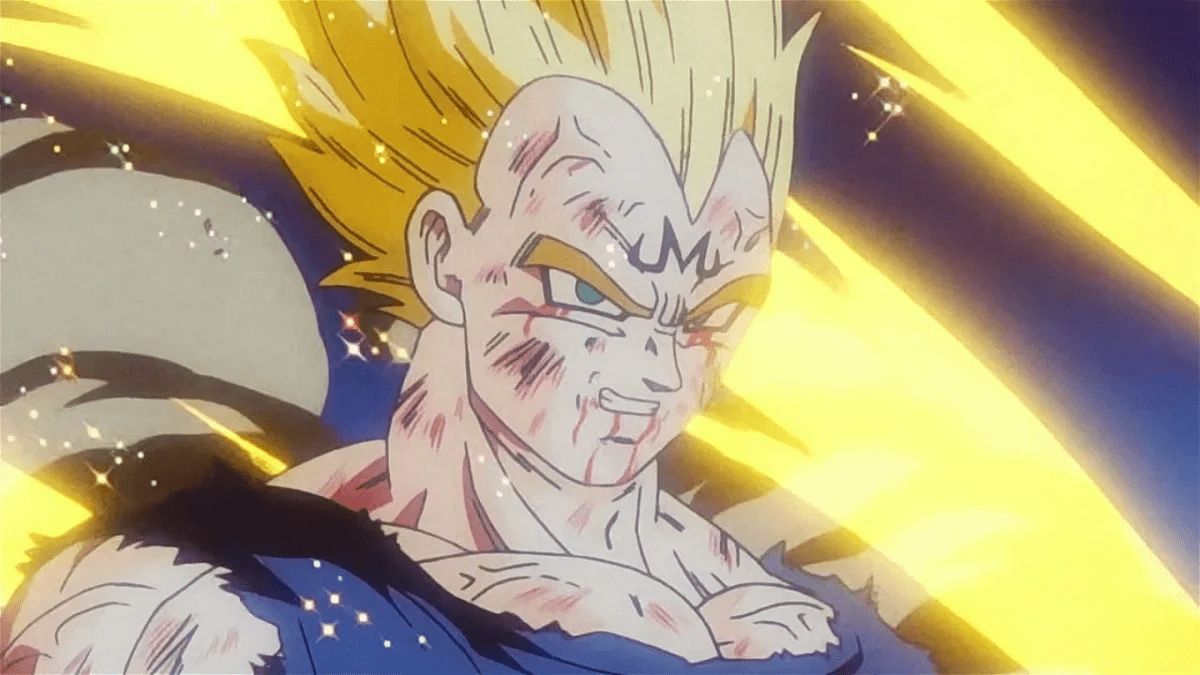 Vegeta con cabello rubio transformado, rodeado de energía amarilla intensa durante su momento de sacrificio